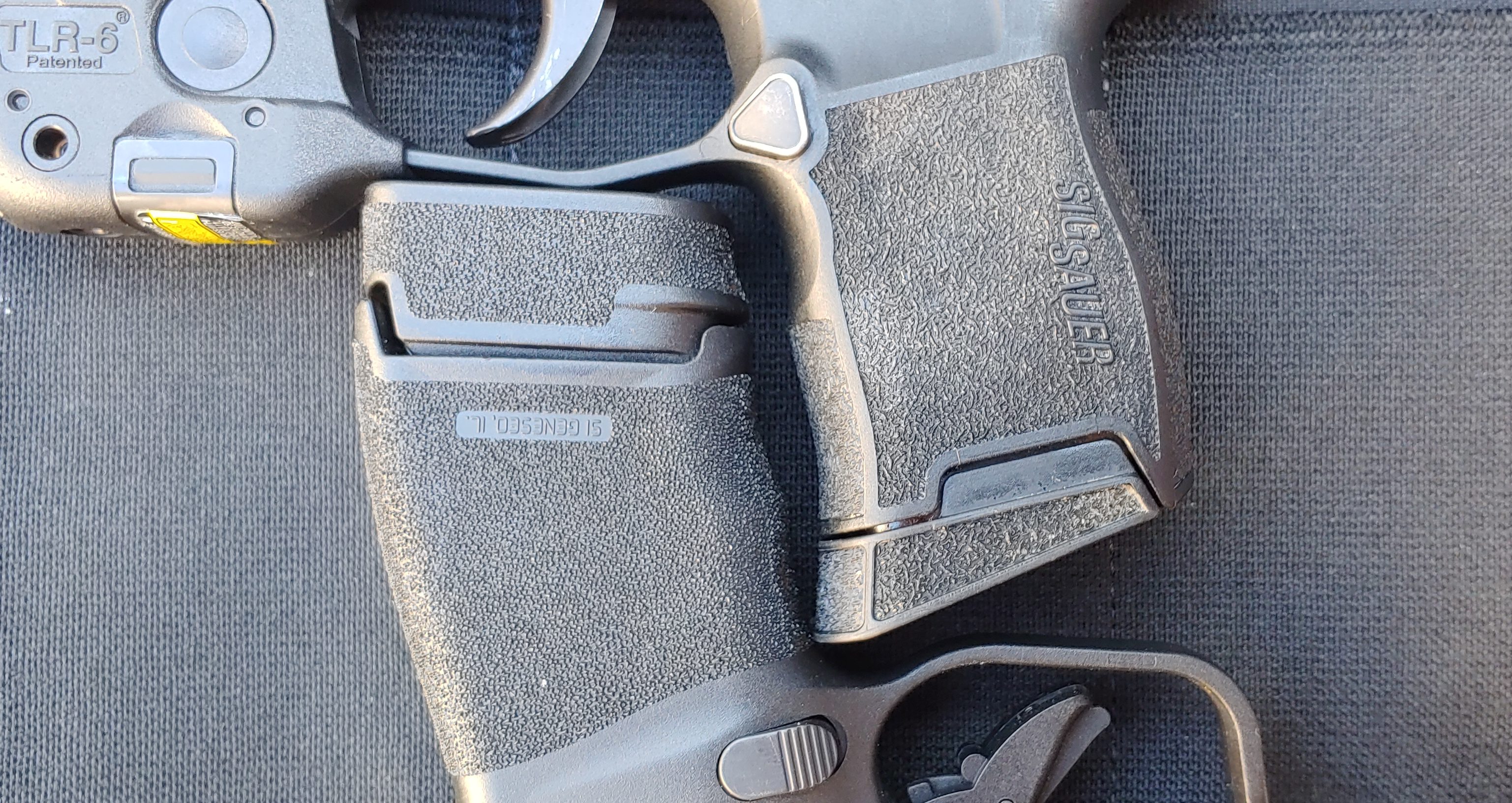 SIG P365, Springfield Hellcat, micro-compact, pistol, concealed carry, CCW, Springfield Armory, Hellcat, P365, Sig Sauer, best concealed carry gun, CCP, best concealed carry holster, IWB, OWB, best hybrid holster, holster, holsters, concealed carry holster, holster for concealed carry, micro-compact pistol, concealed carry firearms, new guns, best gun for concealed carry, CrossBreed Holsters, CrossBreed Blog, Travis Pike