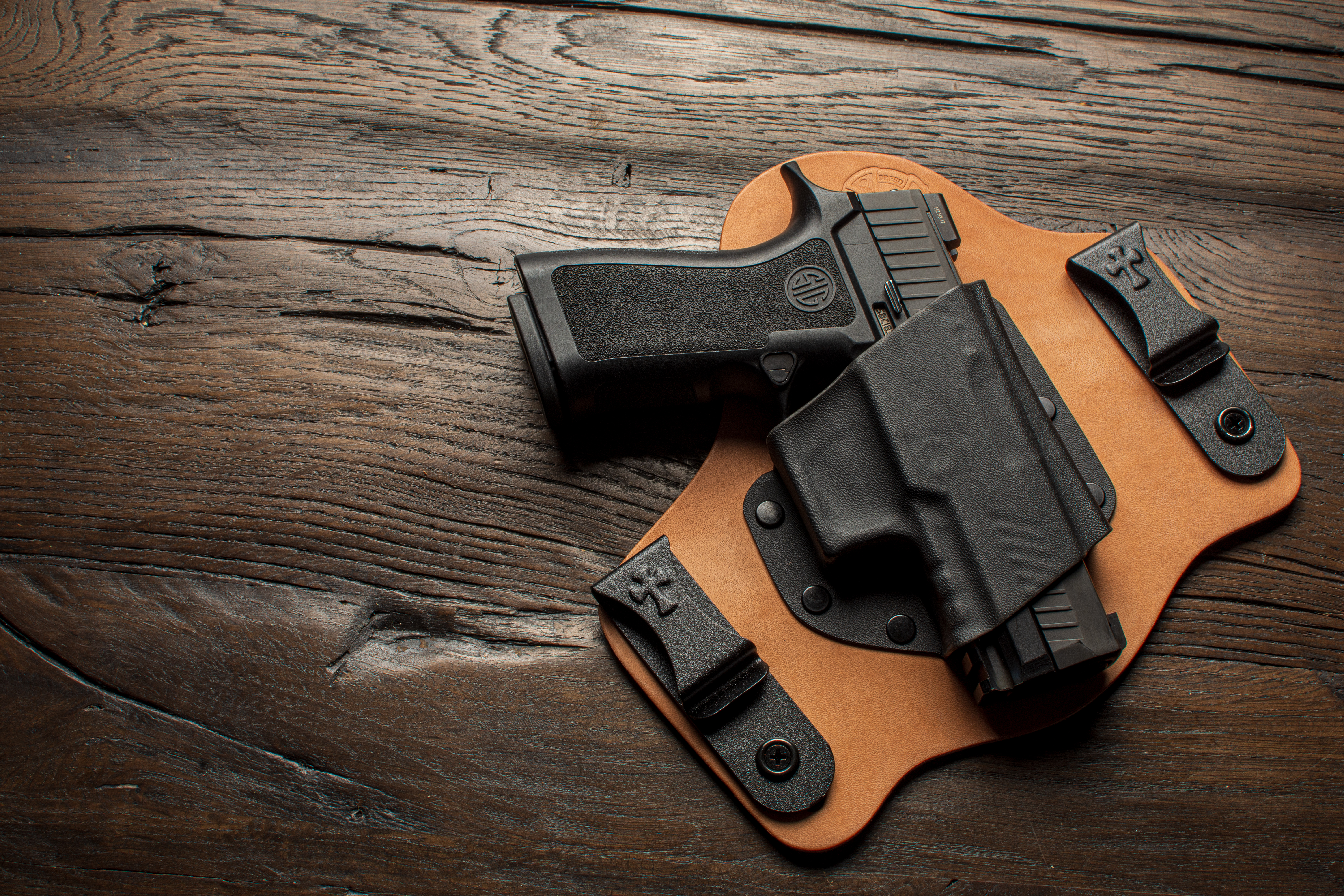 guns, gun sales, best-selling, handguns, pistols, revolvers, NSSF, NICS, 2020 gun sales, pandemic, defund the police, concealed carry, Sig Sauer, P320, P365, Springfield Armory, Hellcat, holsters, CrossBreed Holsters, Smith & Wesson, M&P, Shield, M&P Shield, Beretta, Ruger, Glock, G19, G43, Springfield Hellcat, XD, XDM, Kimber, 1911, 2020 gun sales, self-defense gun, Ruger 57, M9A3, IWB, OWB, IWB Holsters, best-selling guns, 